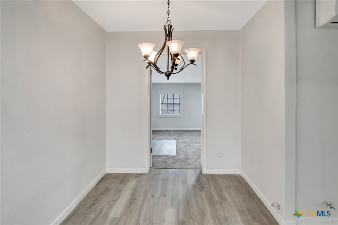 2907 Cedar Street Victoria, TX 77901 - Photo 7 of 45 a view of an entryway with wooden floor