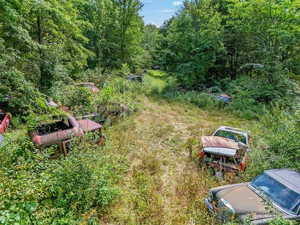 90 Freetown Road Wallkill, NY 12589 - Photo 13 of 17 a backyard of a house with a yard and outdoor seating