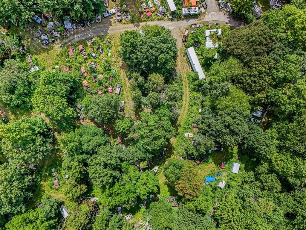 90 Freetown Road Wallkill, NY 12589 - Photo 8 of 17 an aerial view of residential house with outdoor space and trees all around