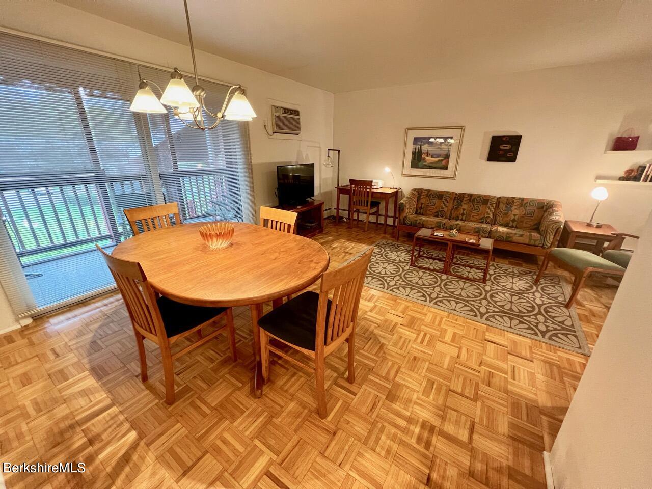 260 Pittsfield Road, Unit E5 Lenox, MA 01240 - Photo 9 of 24 Dining into Living room