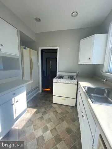 a utility room with washer and dryer