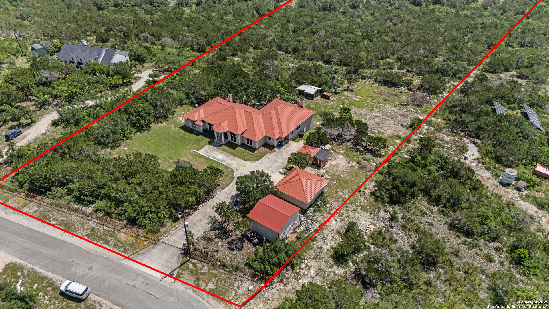 165 County Road 2740 Mico, TX 78056 - Photo 28 of 30 an aerial view of a house