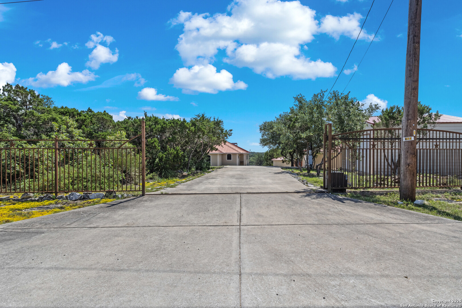 165 County Road 2740 Mico, TX 78056 - Photo 3 of 30 a view of a yard with palm tree