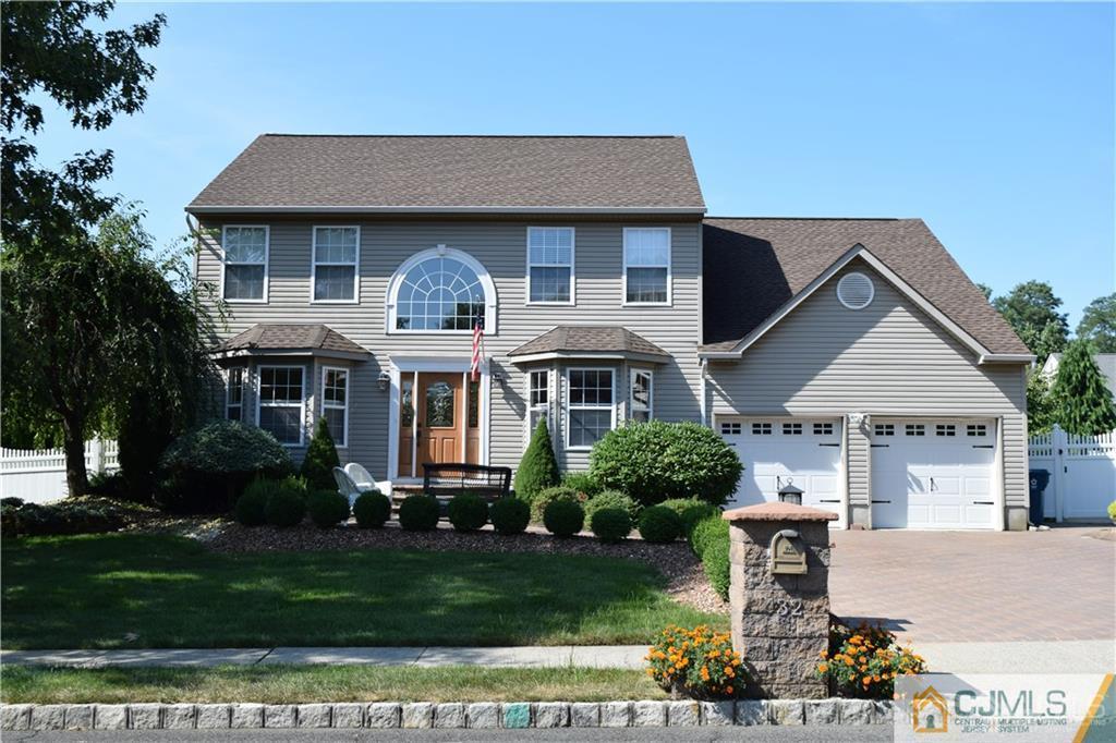 32 Stratton Road Old Bridge, NJ 07747 - Photo 1 of 24 a front view of a house with a yard