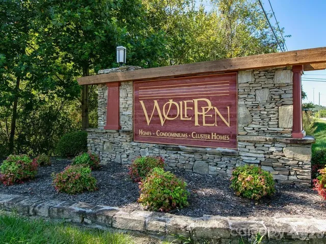 a view of a living room and balcony