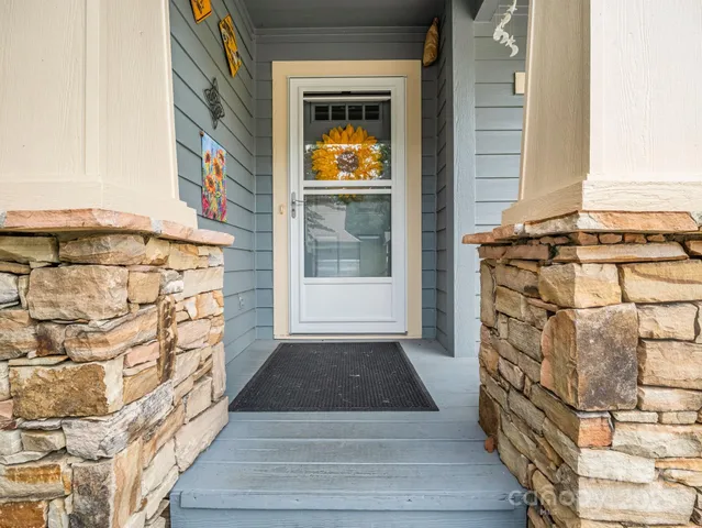 a bathroom with a sink and a shower curtain