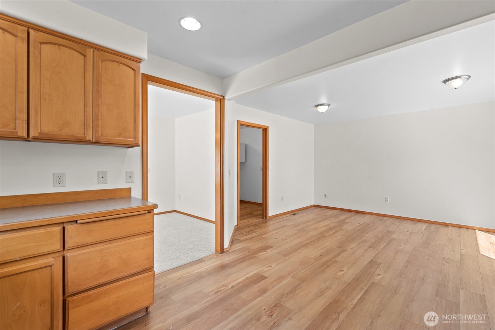 1111 Splett Street Wenatchee, WA 98801 - Photo 16 of 36 a view of an empty room with wooden floor and a window