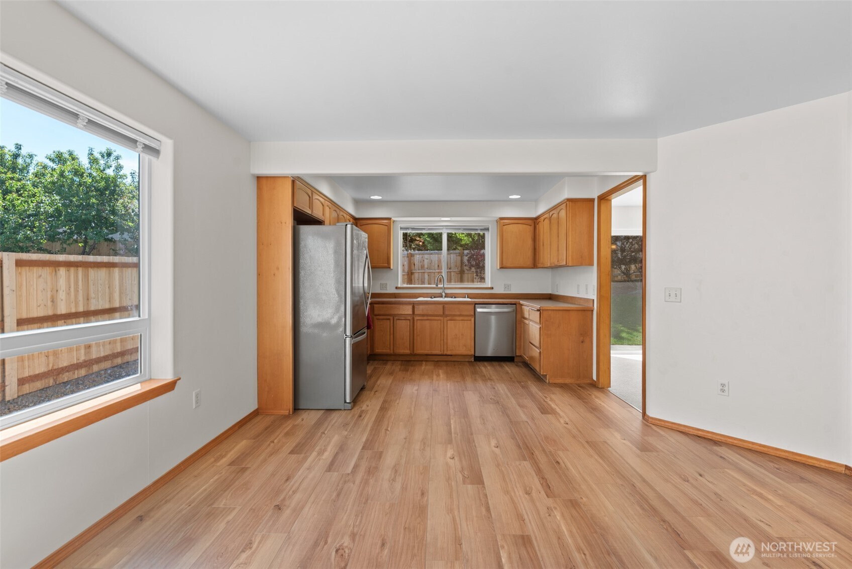 1111 Splett Street Wenatchee, WA 98801 - Photo 19 of 36 a view of a kitchen with wooden floor electronic appliances and windows