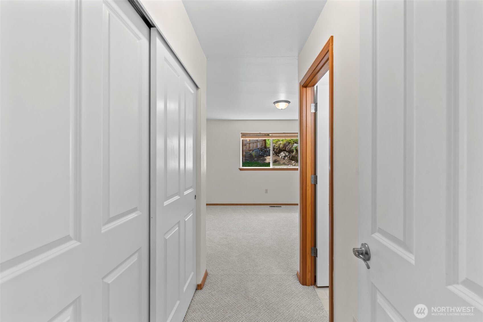 1111 Splett Street Wenatchee, WA 98801 - Photo 25 of 36 a view of a hallway with wooden floor and a bathroom