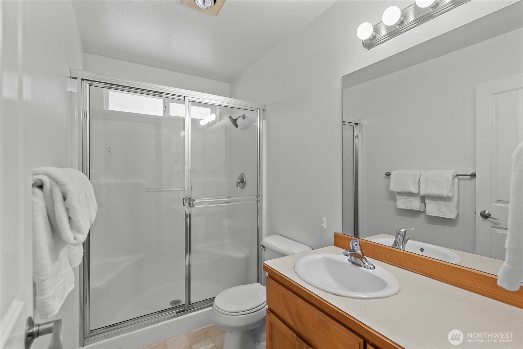 1111 Splett Street Wenatchee, WA 98801 - Photo 26 of 36 a bathroom with a sink toilet and shower