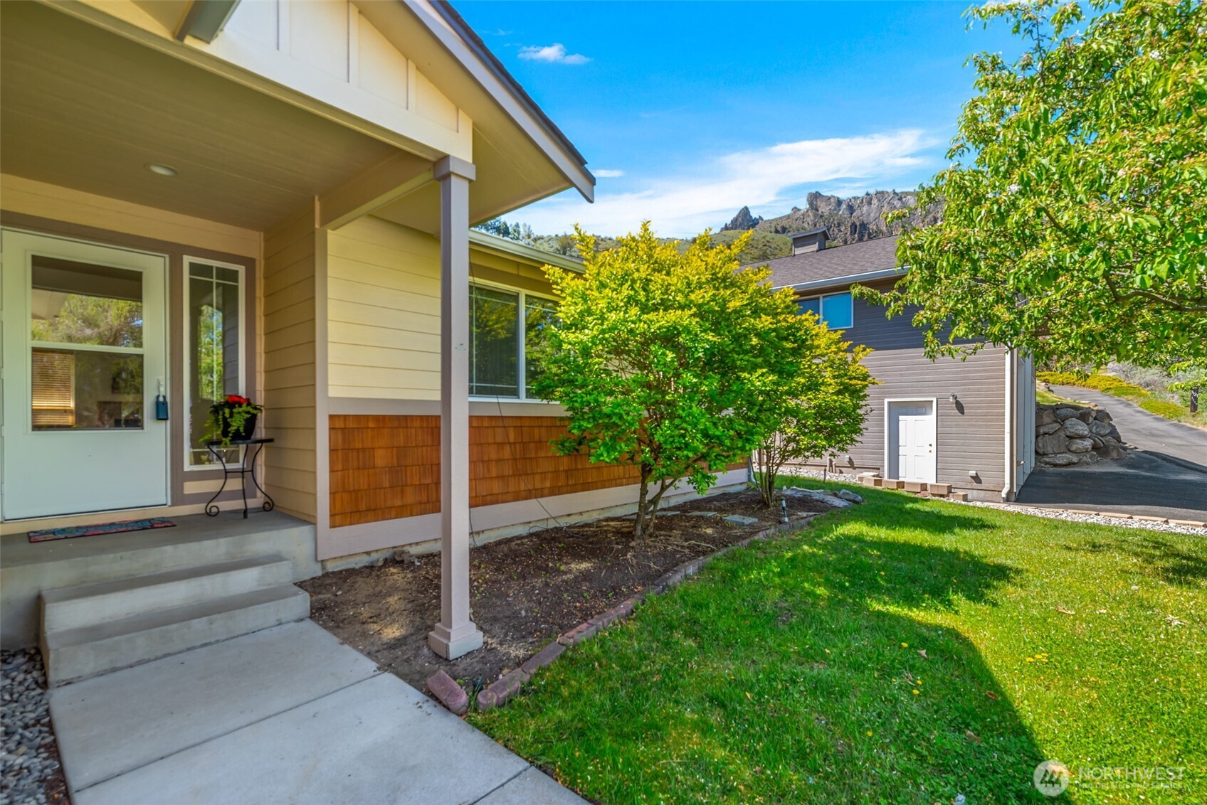 1111 Splett Street Wenatchee, WA 98801 - Photo 36 of 36 a view of a house with backyard and a tree
