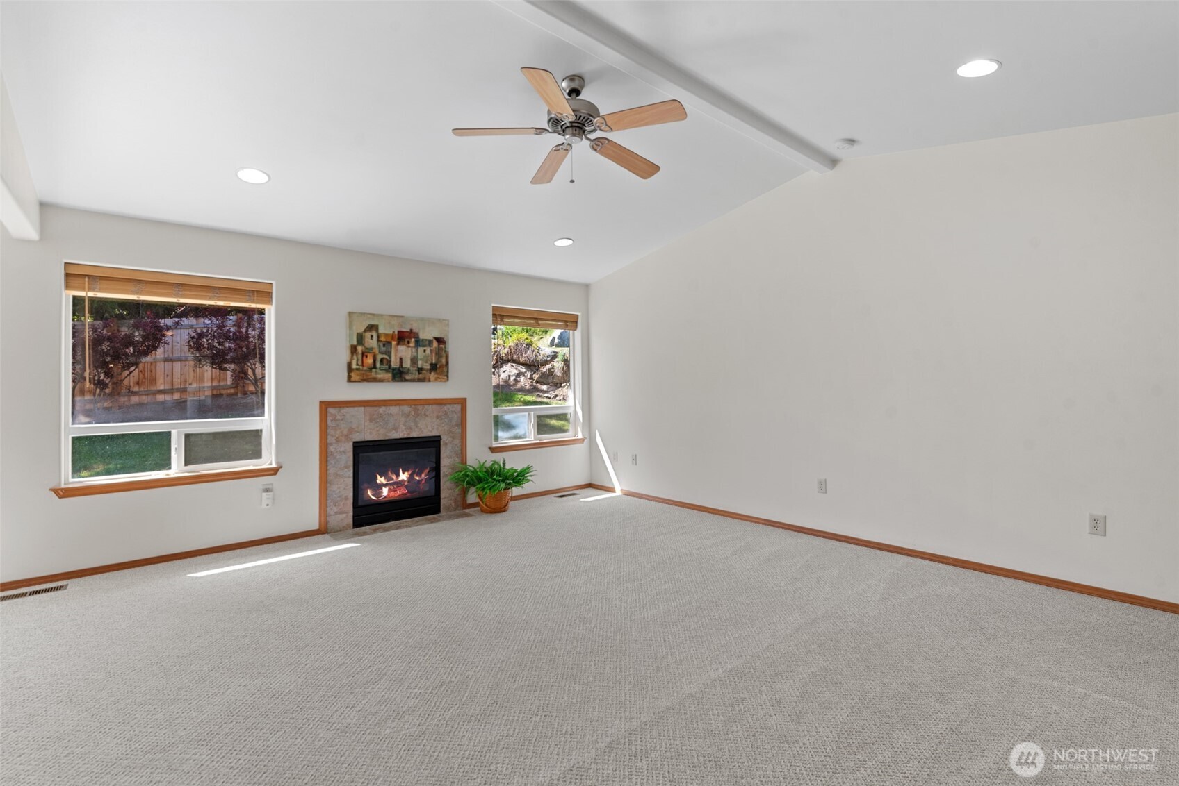 1111 Splett Street Wenatchee, WA 98801 - Photo 7 of 36 an empty room with windows and fireplace