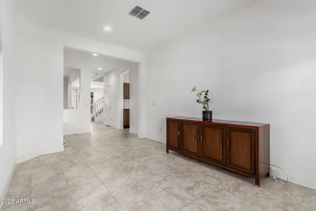 a view of a hallway with closet