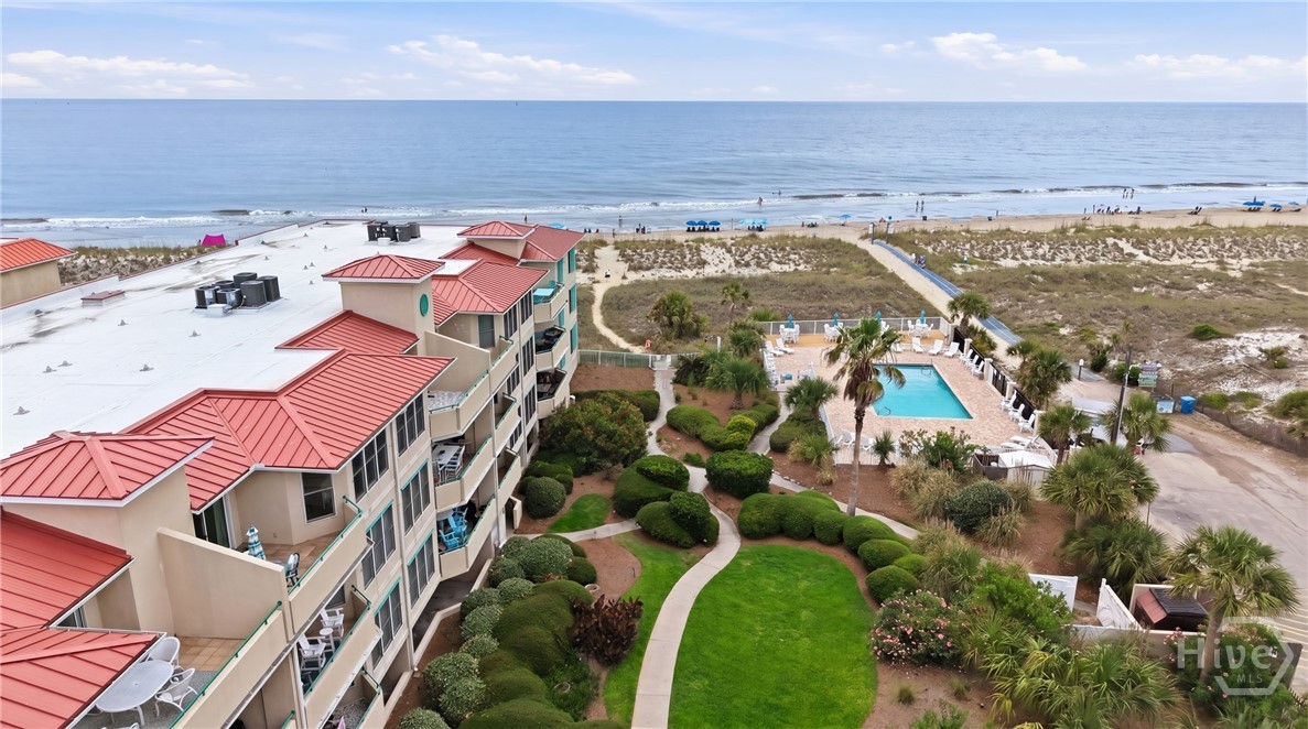 214 Butler Avenue, Unit 306 Tybee Island, GA 31328 - Photo 38 of 49 Grass digitally enhanced for marketing