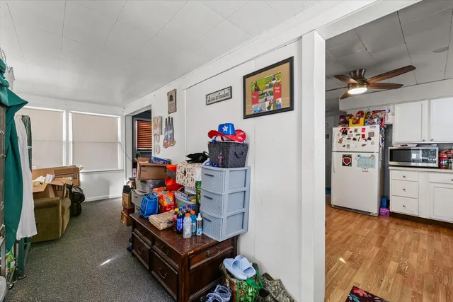 a room with furniture and gym equipment