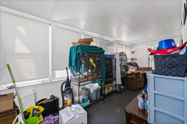 a children room with toys and white walls