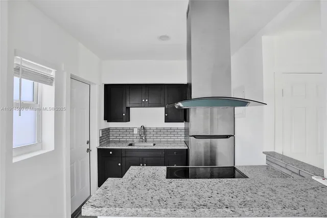 a view of workspace with wooden floor