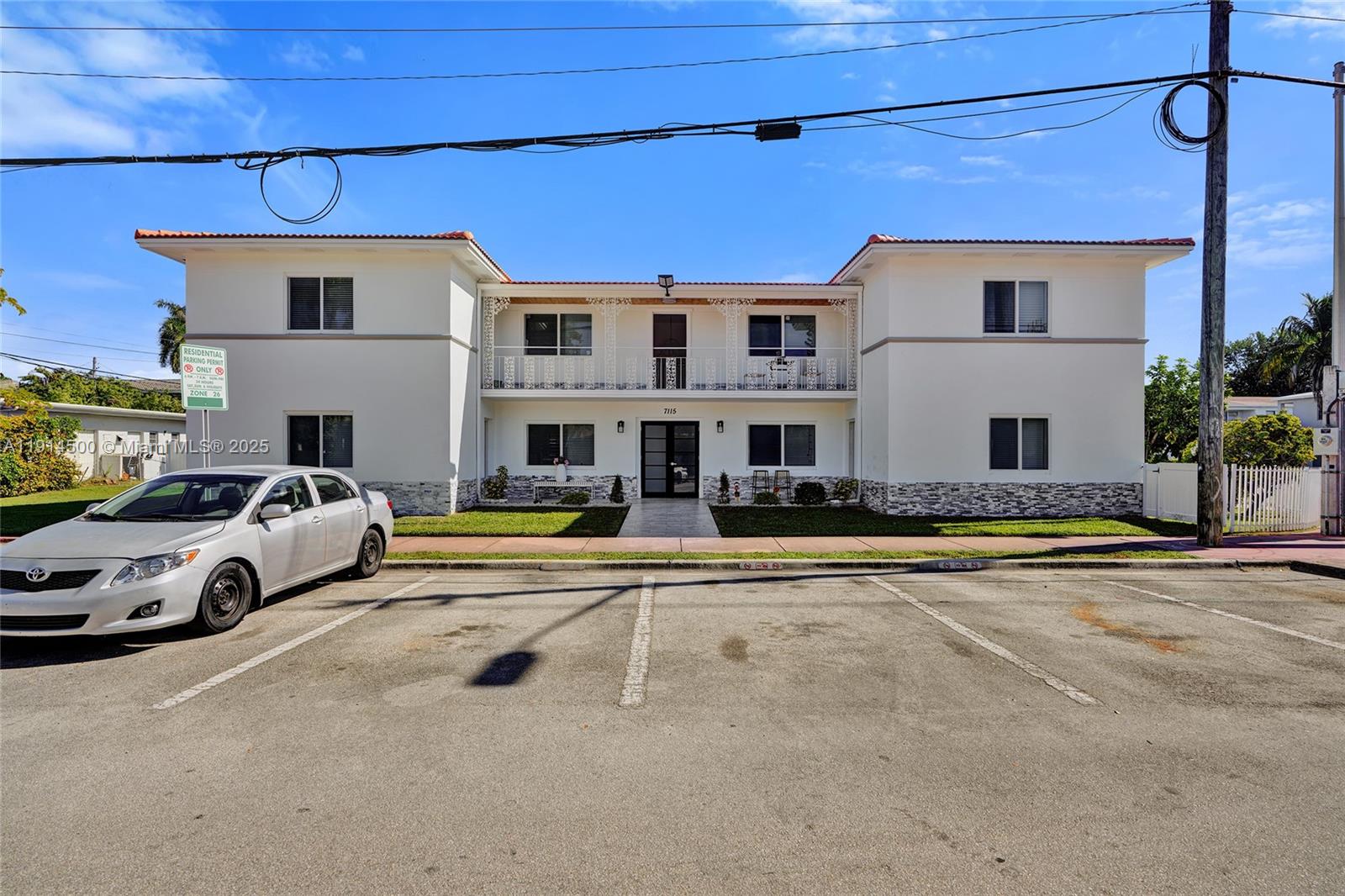 7115 Rue Granville, Unit C Miami Beach, FL 33141 - Photo 3 of 25 a view of a house with a swimming pool