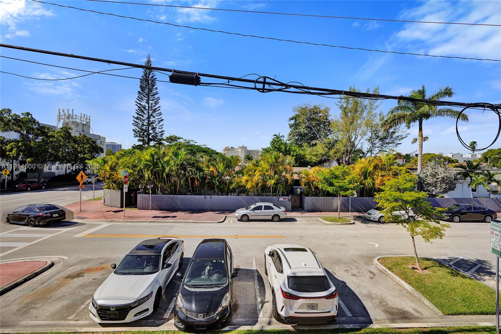 7115 Rue Granville, Unit C Miami Beach, FL 33141 - Photo 5 of 25 a view of a patio with table and chairs potted plants