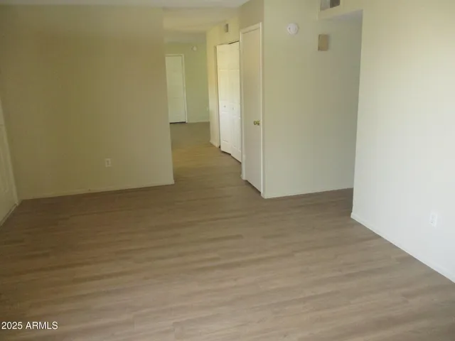 a kitchen with a stove and a refrigerator