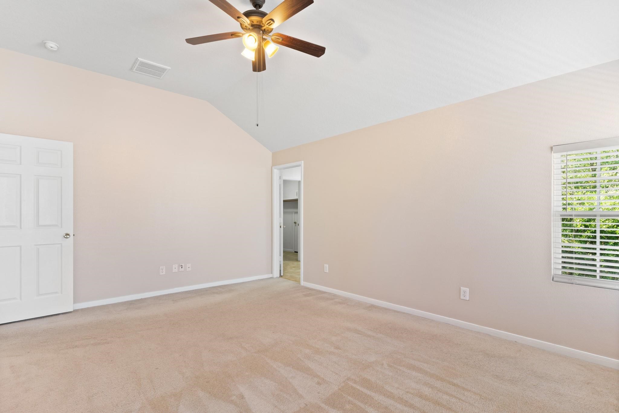 5038 Forest Hurst Drive Spring, TX 77373 - Photo 19 of 22 a view of a room with a window and a ceiling fan