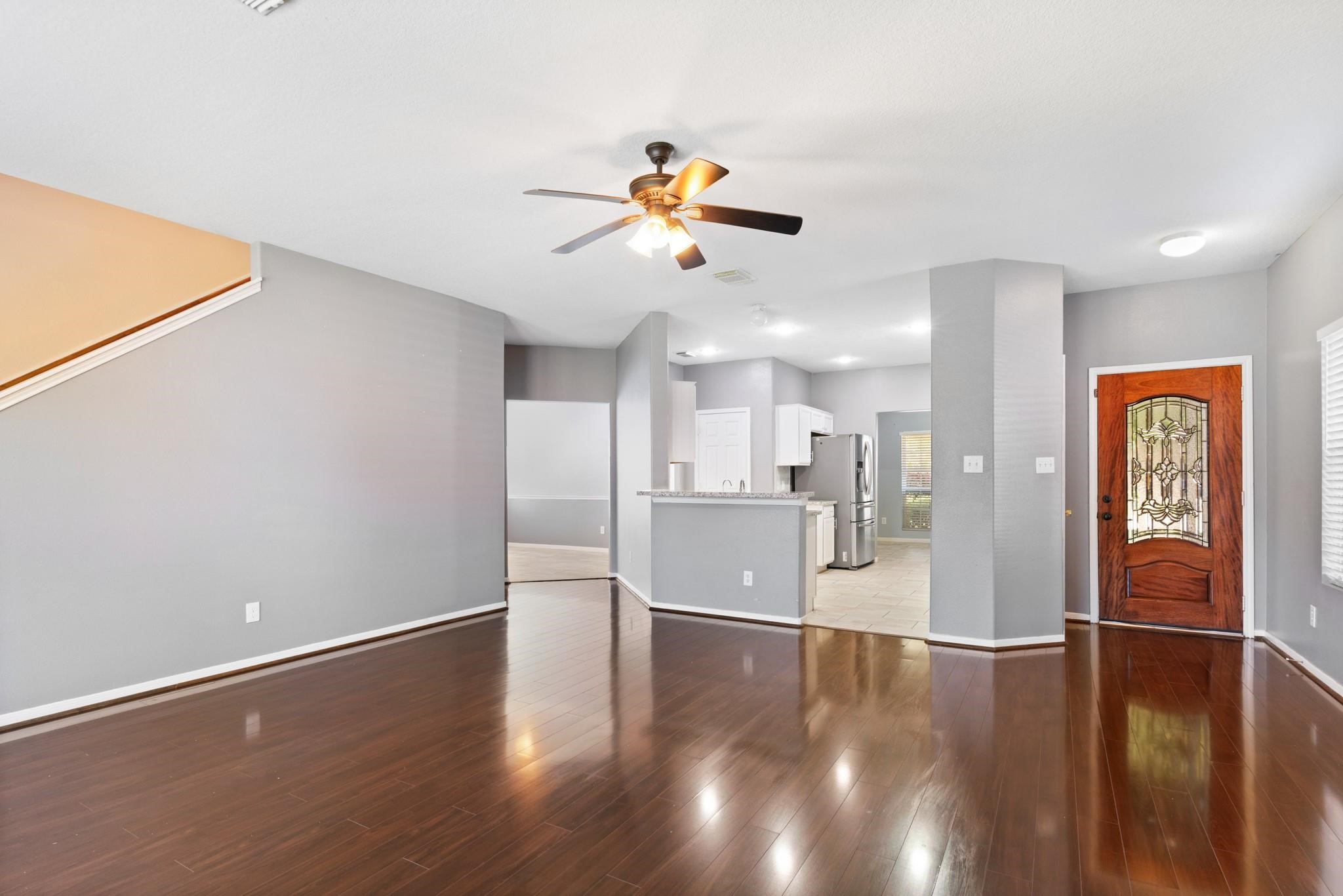 5038 Forest Hurst Drive Spring, TX 77373 - Photo 2 of 22 a view of a kitchen with a sink and a refrigerator