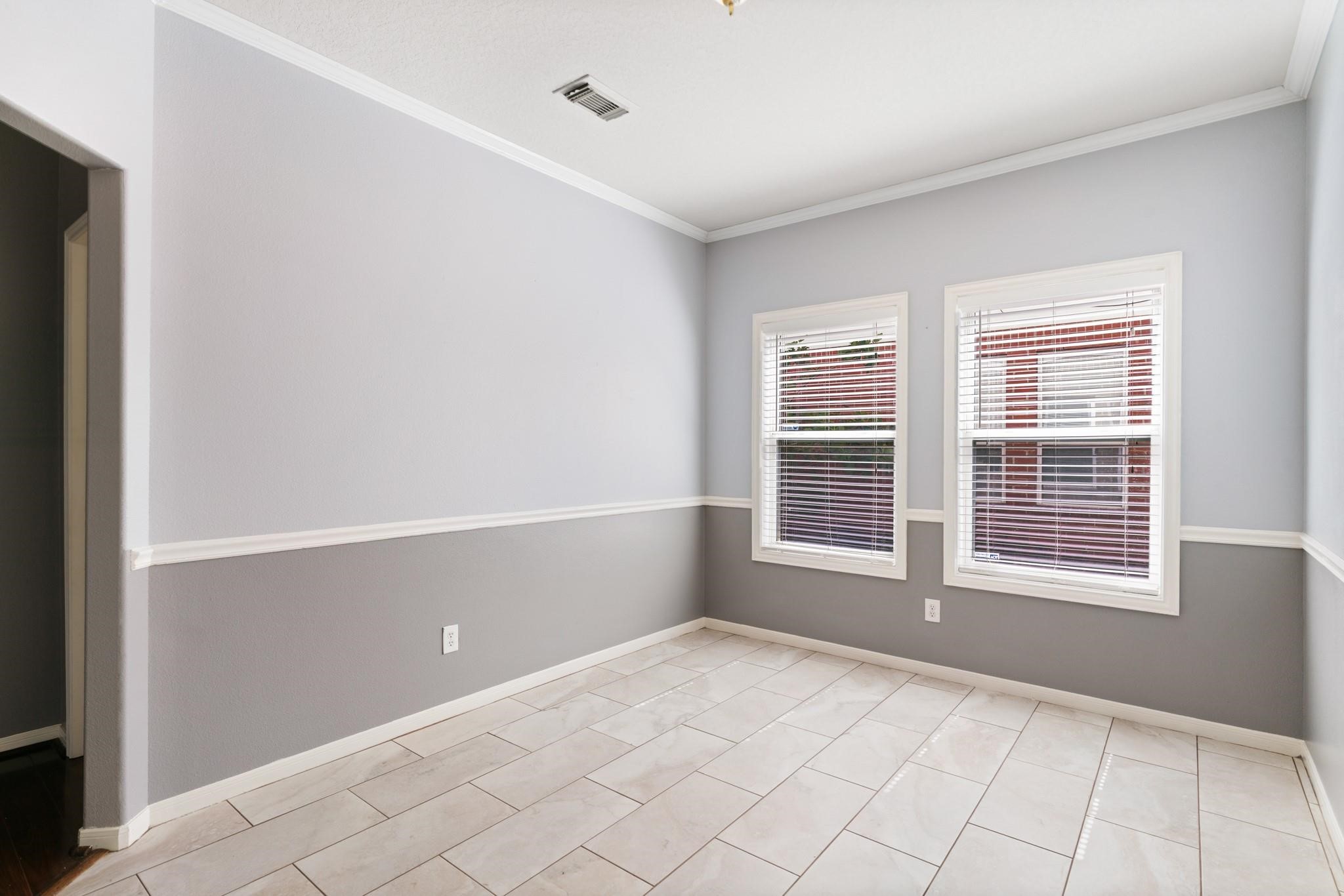 5038 Forest Hurst Drive Spring, TX 77373 - Photo 6 of 22 a view of an empty room with a window