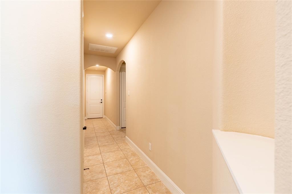 9101 Waters Lane Rowlett, TX 75089 - Photo 17 of 34 a view of a bathroom with shower