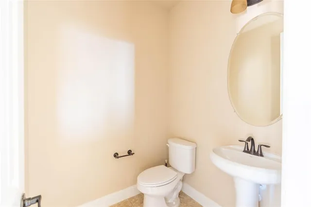 a bathroom with a sink and a toilet