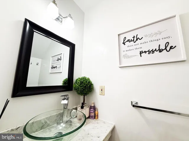 a bathroom with a toilet and a sink