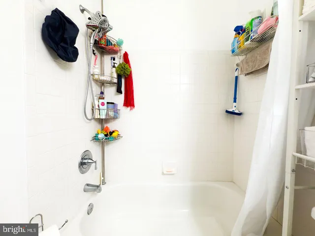 a bathroom with a sink and a shower