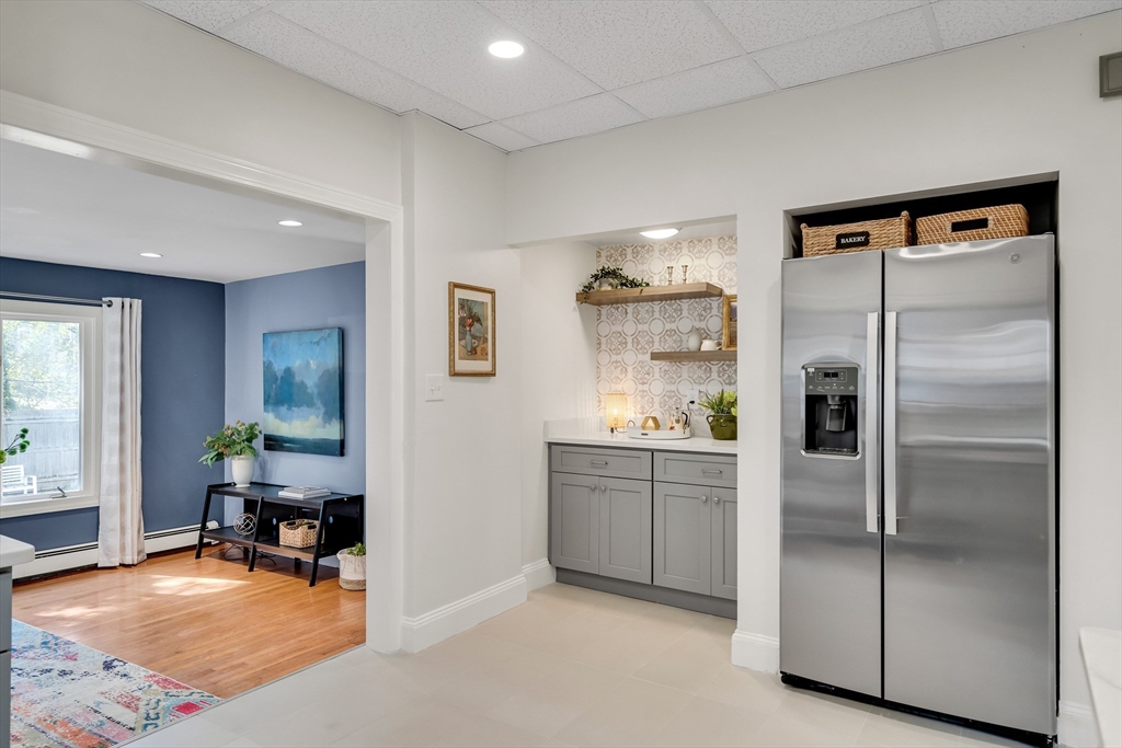 62 Florence Road Waltham, MA 02453 - Photo 14 of 42 a kitchen with a refrigerator and a sink