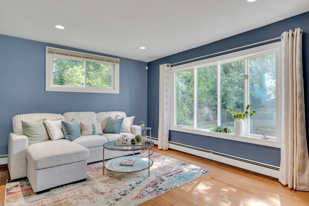 62 Florence Road Waltham, MA 02453 - Photo 16 of 42 a living room with furniture and a large window