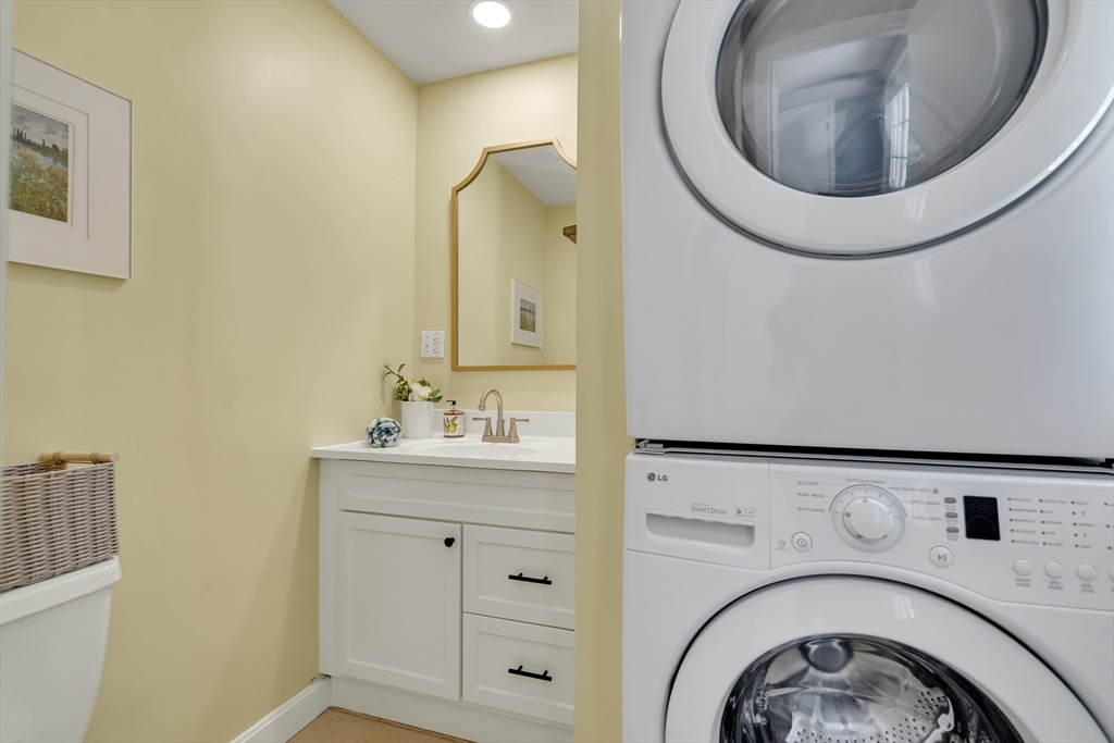 62 Florence Road Waltham, MA 02453 - Photo 20 of 42 a utility room with dryer and washer