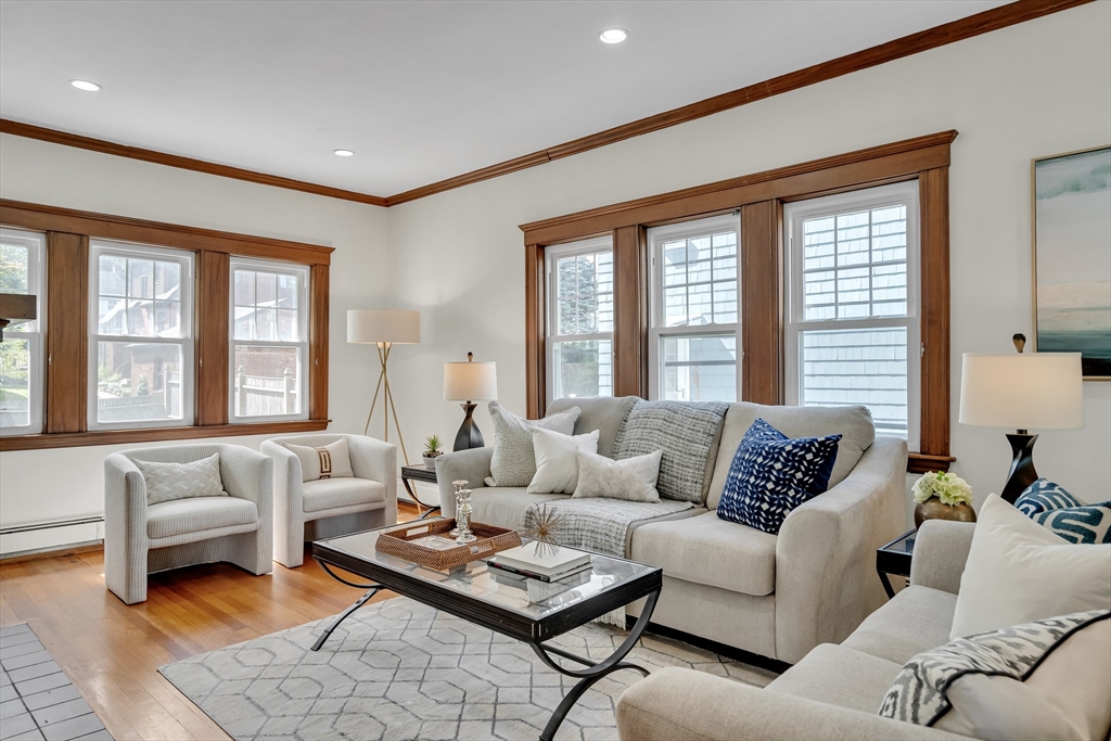 62 Florence Road Waltham, MA 02453 - Photo 2 of 42 a living room with furniture and large windows