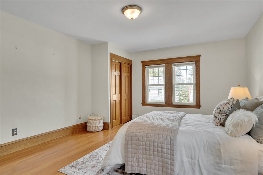 62 Florence Road Waltham, MA 02453 - Photo 23 of 42 a bedroom with a bed and a window
