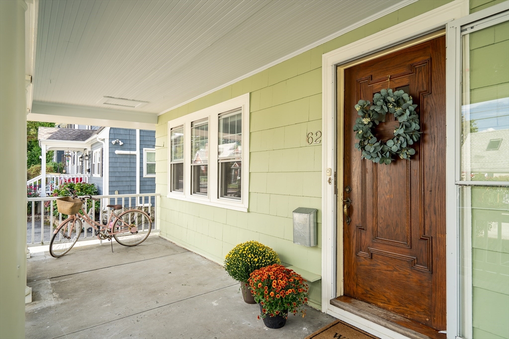 62 Florence Road Waltham, MA 02453 - Photo 30 of 42 a front view of a house with a window and potted plant