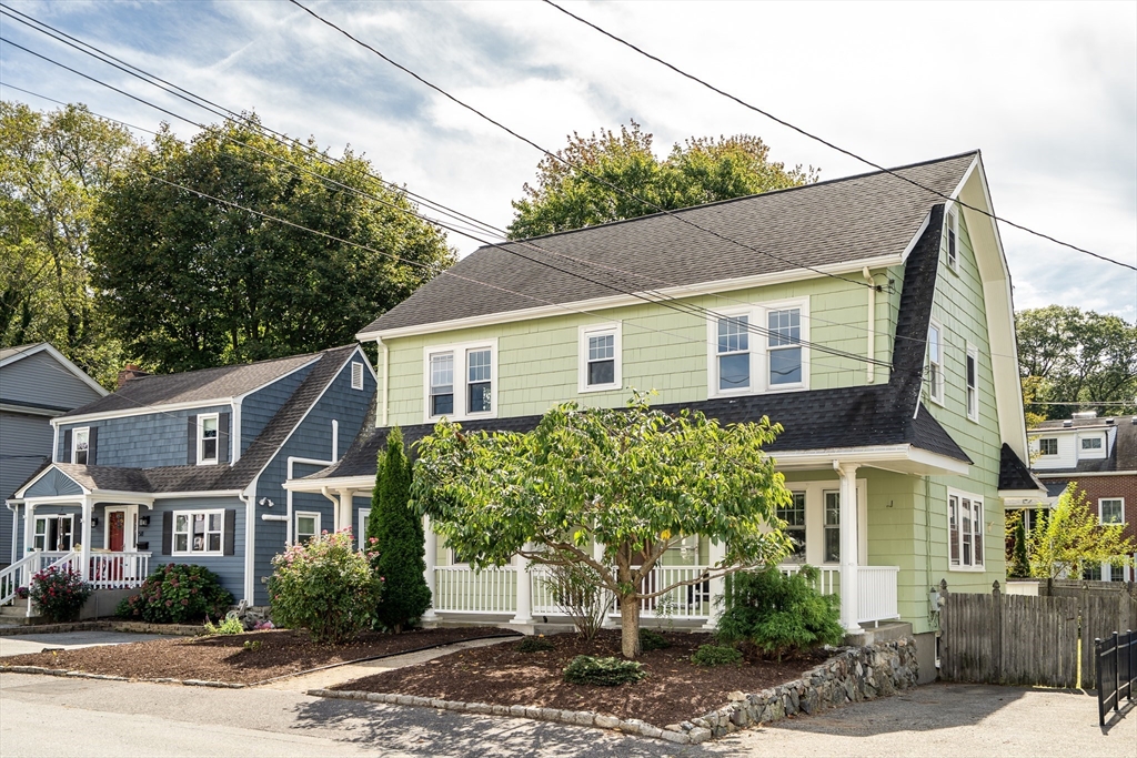 62 Florence Road Waltham, MA 02453 - Photo 39 of 42 a front view of a house with garden