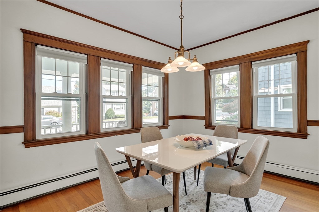 62 Florence Road Waltham, MA 02453 - Photo 7 of 42 a view of a dining room with furniture window and outside view