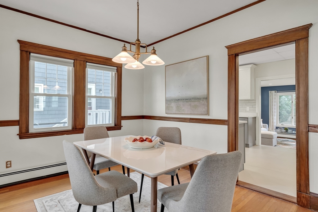 62 Florence Road Waltham, MA 02453 - Photo 8 of 42 a view of a dining room with furniture window and wooden floor