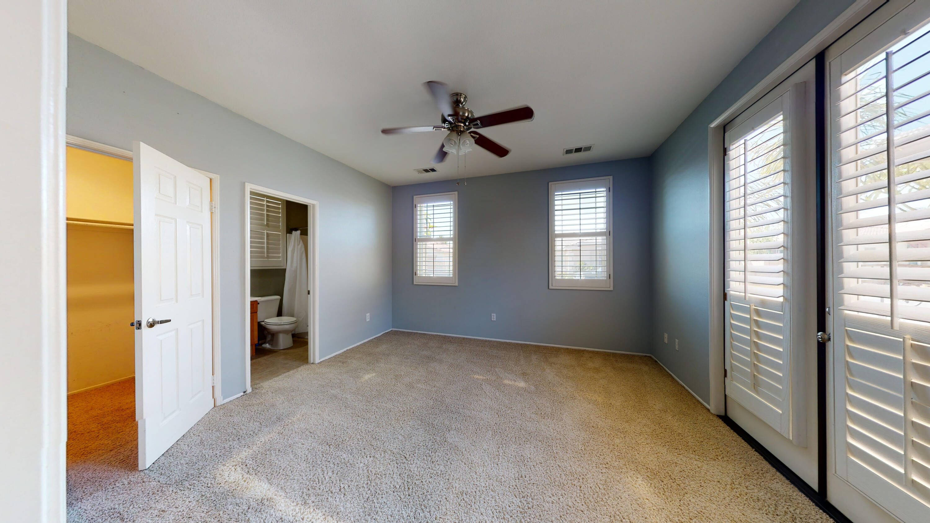 82712 Kyle Drive Indio, CA 92203 - Photo 21 of 29 a view of an empty room with a window