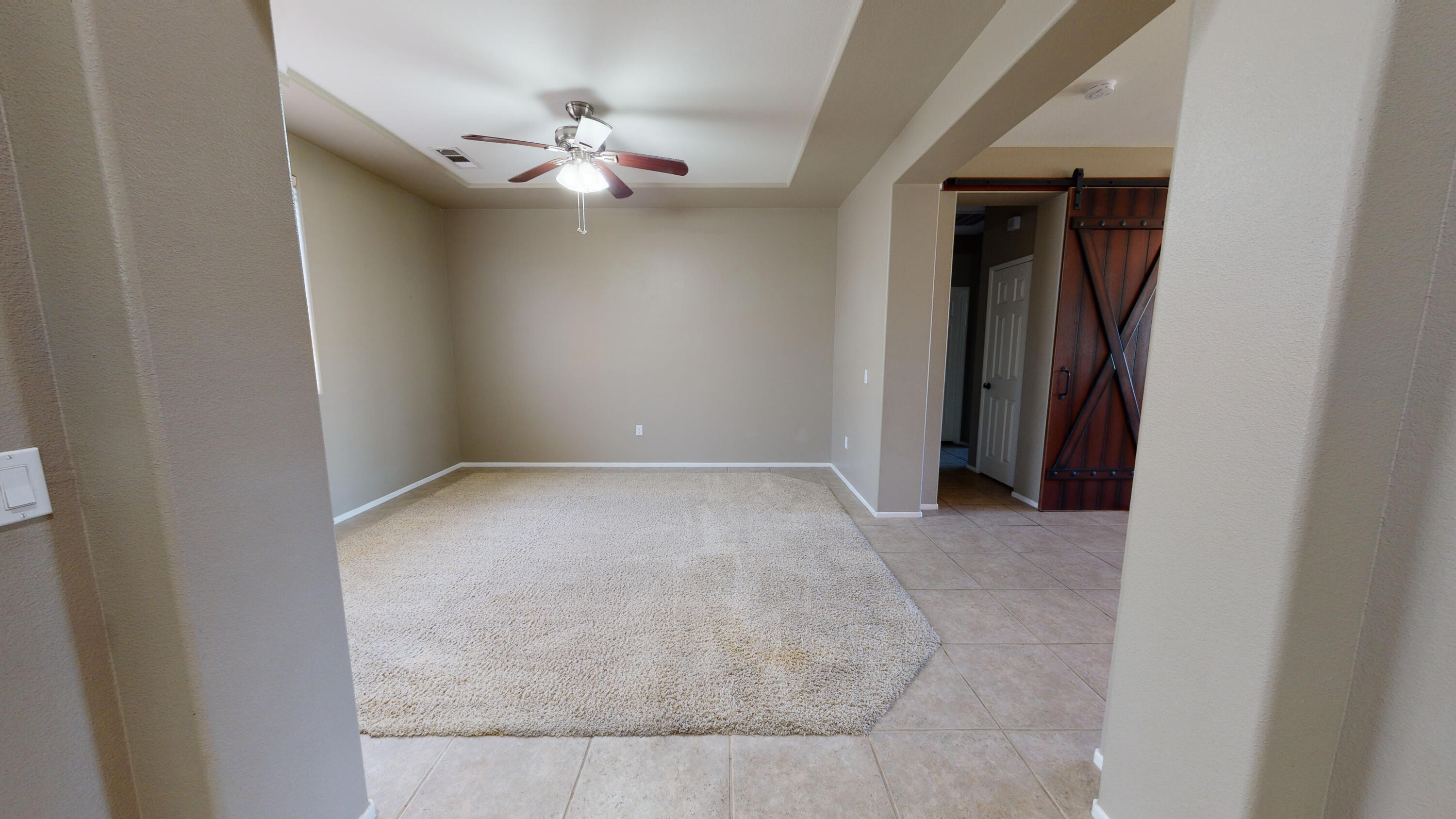 82712 Kyle Drive Indio, CA 92203 - Photo 26 of 29 a view of a room with a ceiling fan and bathroom space