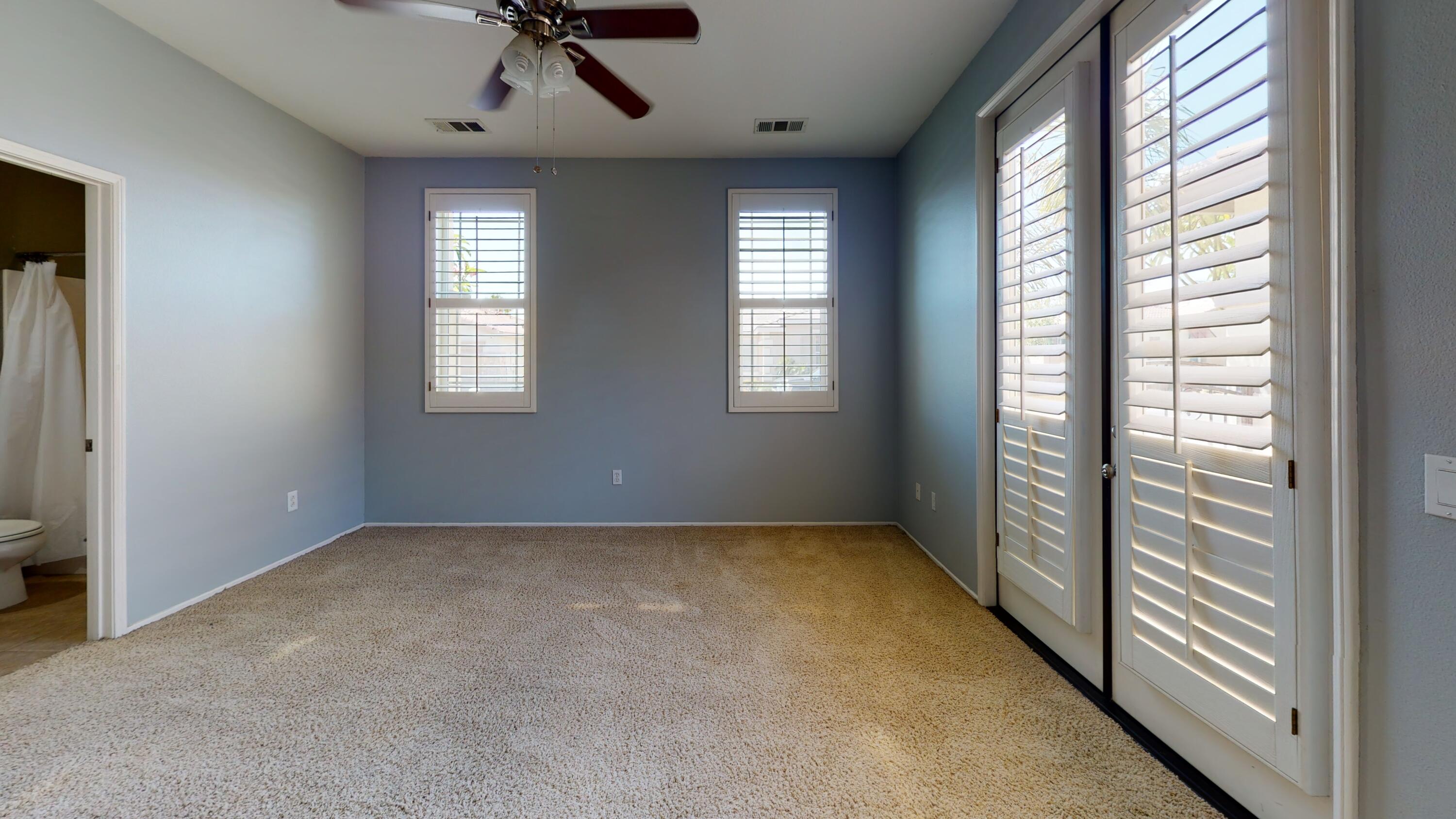 82712 Kyle Drive Indio, CA 92203 - Photo 9 of 29 a view of an empty room with a window
