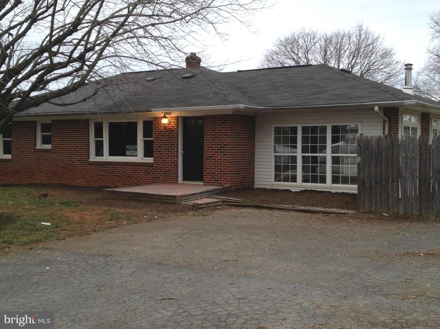 a front view of a house with a garage