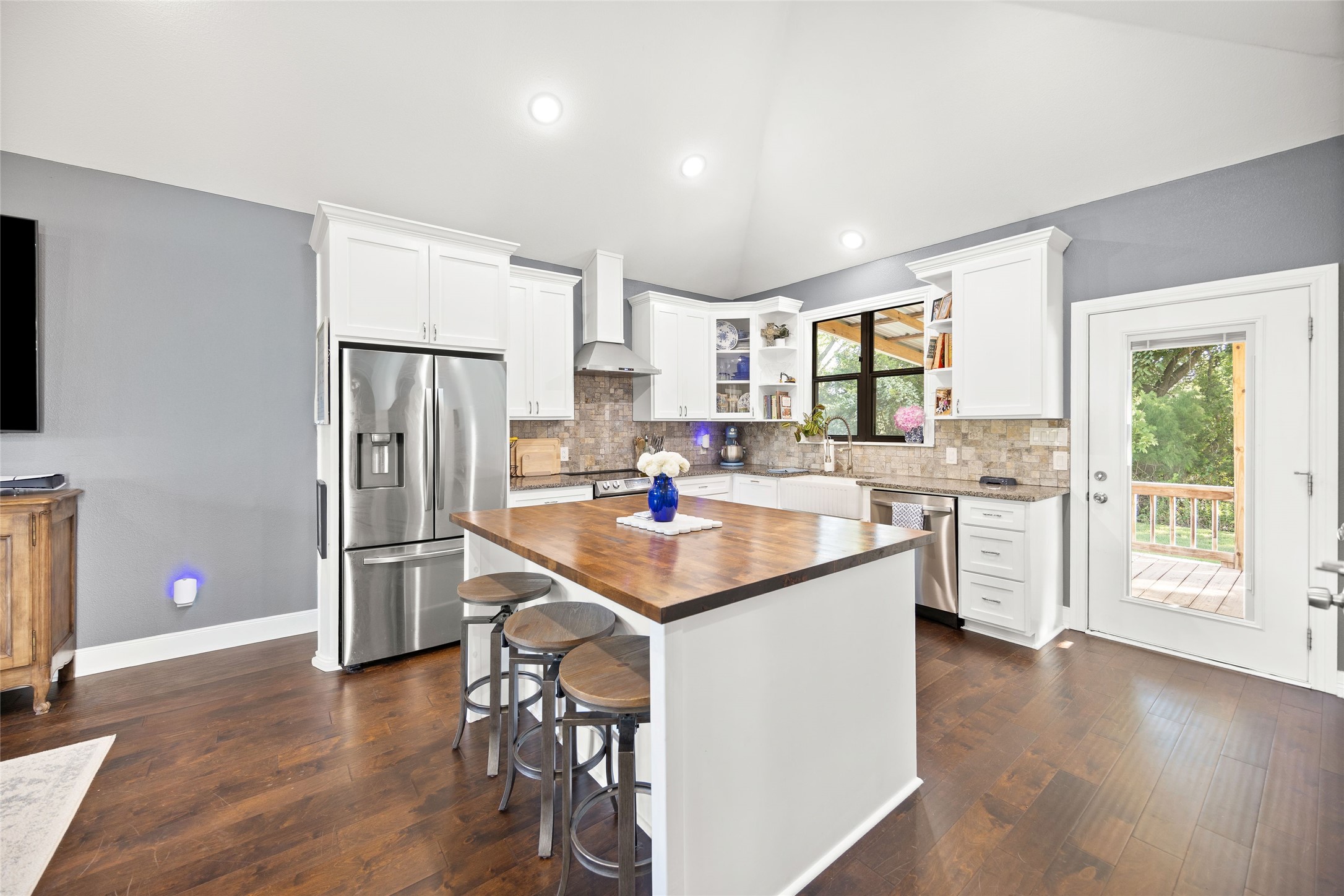 2021 Strangmeier Road Brenham, TX 77833 - Photo 10 of 16 Enjoy the seamless flow into your amazing modern style kitchen with beautiful light cabinetry, abundant storage, and the focal point of this beautiful butcher-block countertop.