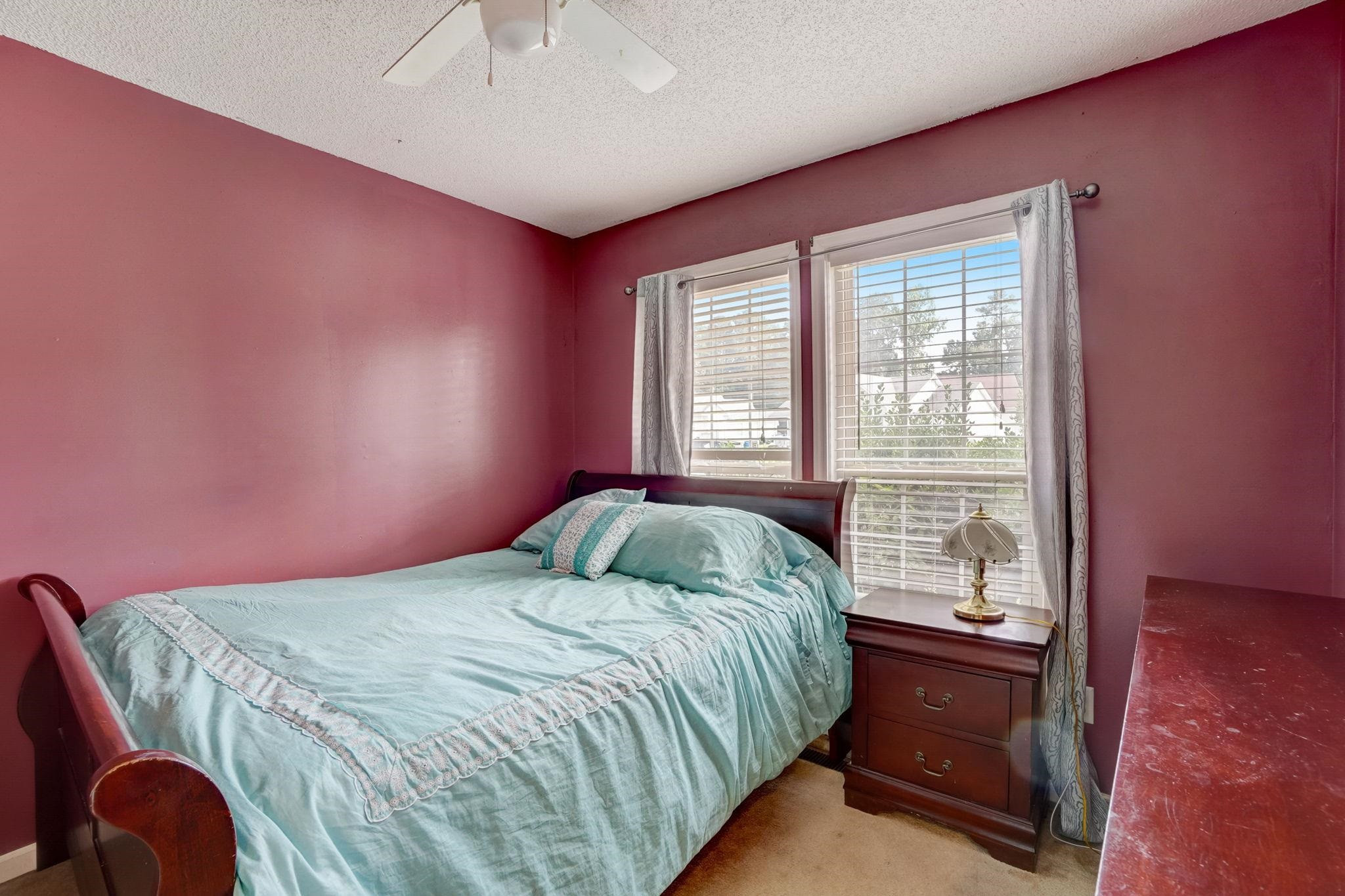 7133 Spanglers Spring Way Raleigh, NC 27610 - Photo 14 of 17 a bedroom with a bed and a window
