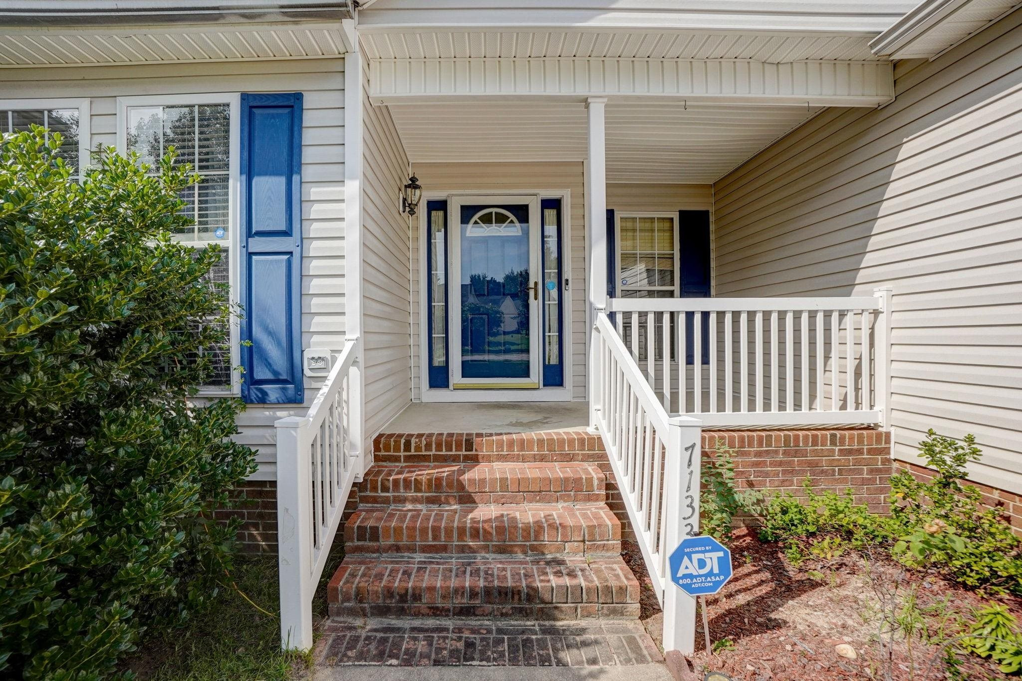 7133 Spanglers Spring Way Raleigh, NC 27610 - Photo 2 of 17 a front view of a house
