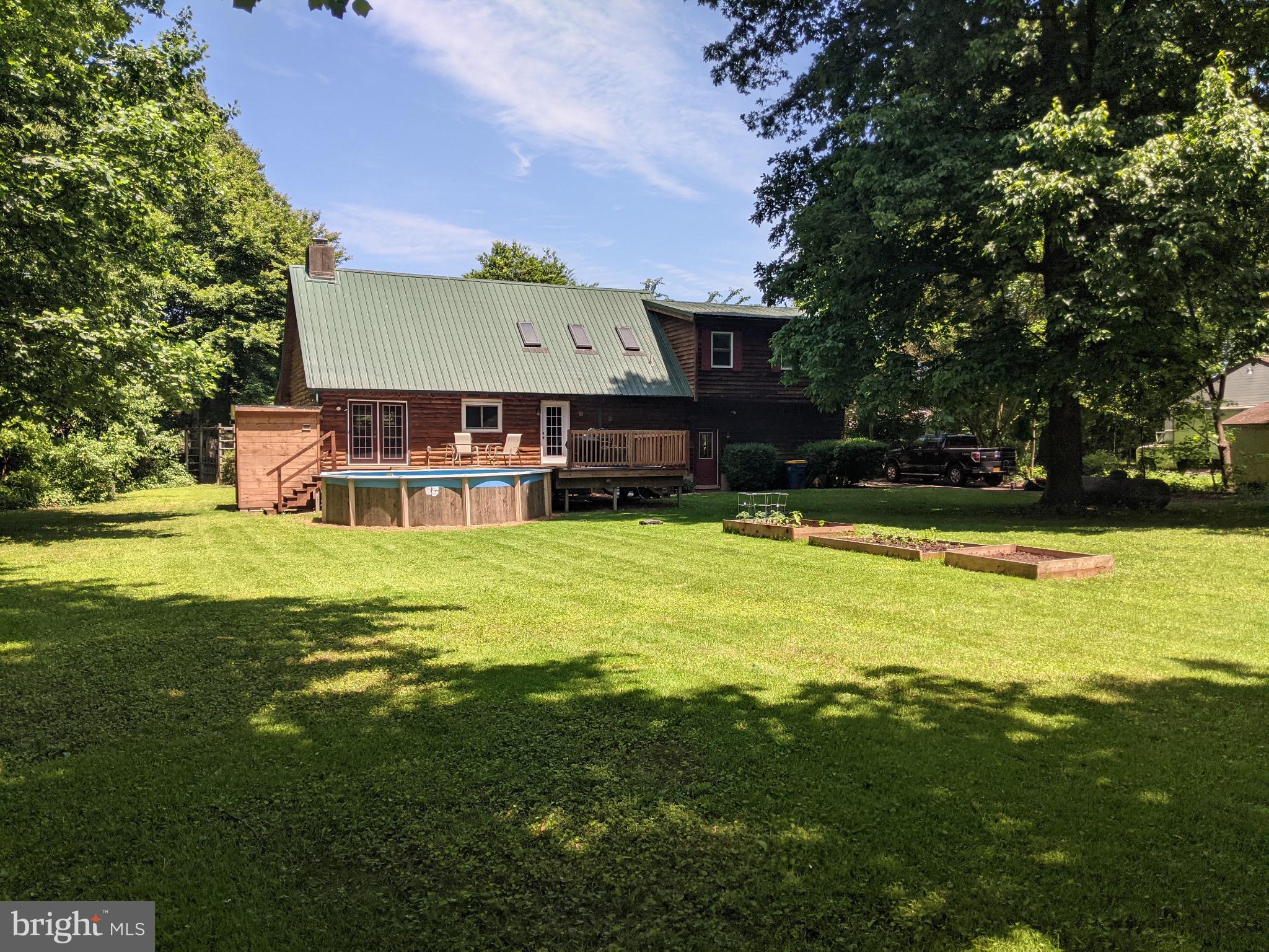 334 Sophers Row Magnolia, DE 19962 - Photo 13 of 47 a view of a house with a big yard