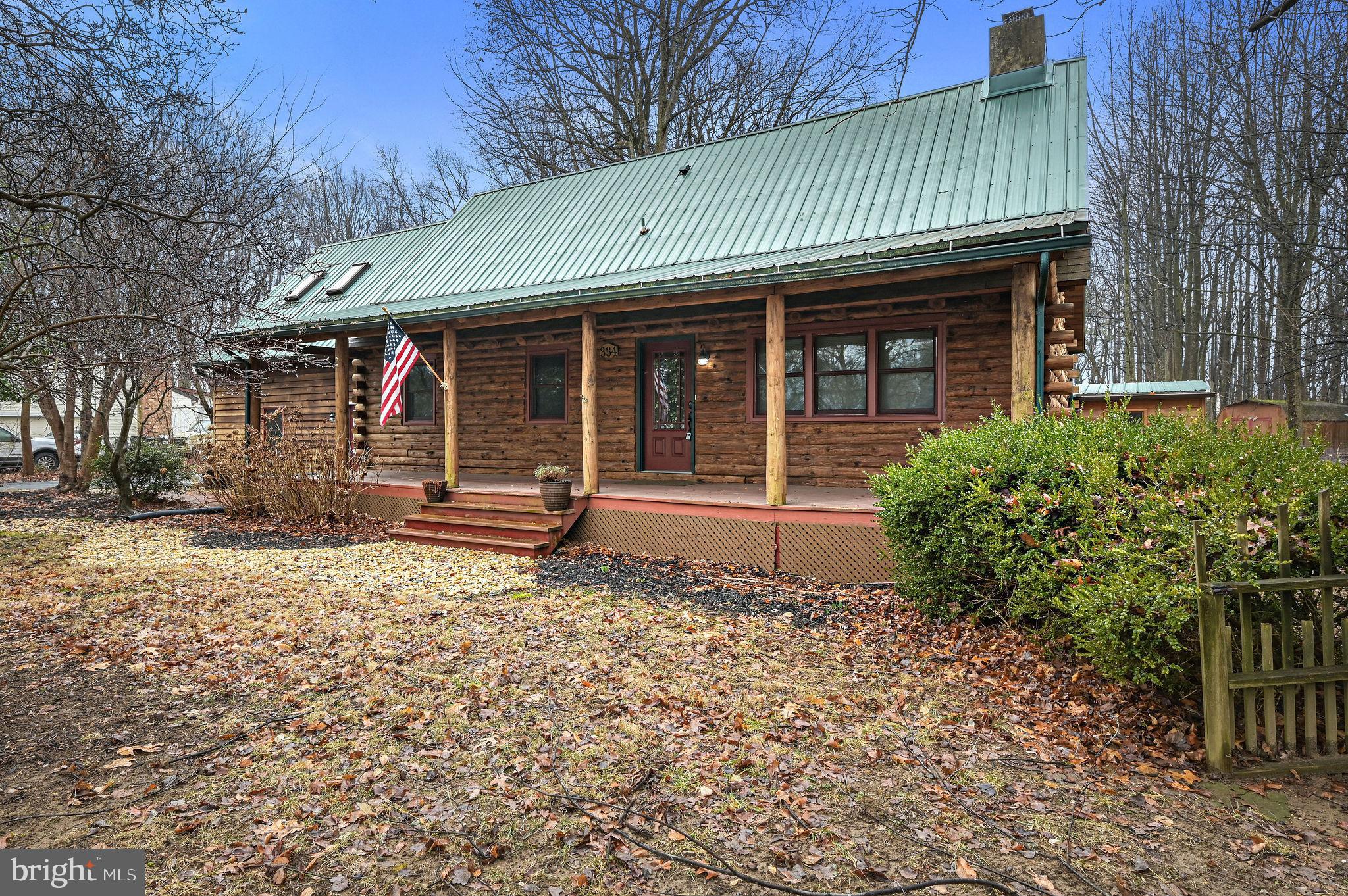 334 Sophers Row Magnolia, DE 19962 - Photo 2 of 47 a front view of a house with garden