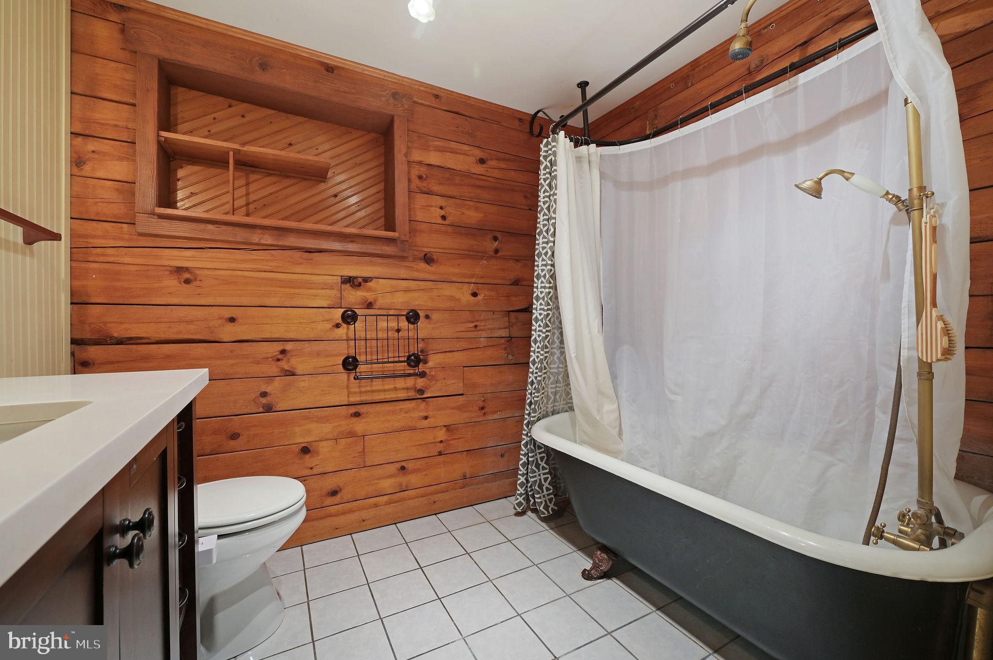 334 Sophers Row Magnolia, DE 19962 - Photo 34 of 47 a bathroom with a granite countertop sink toilet and shower